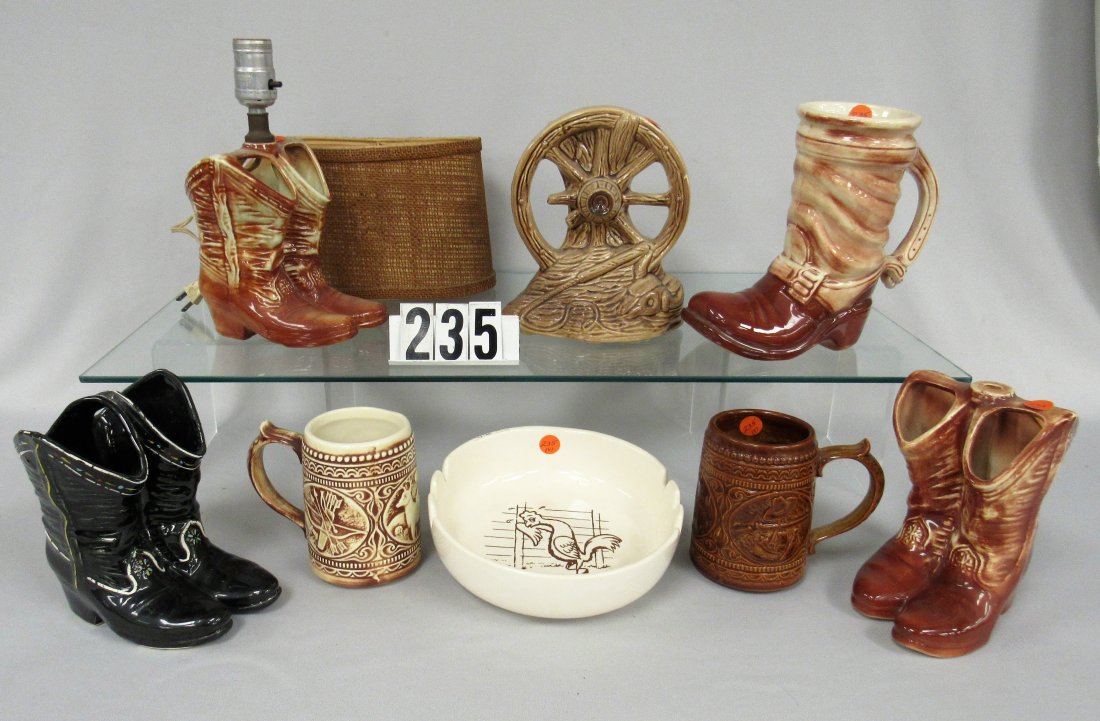 8 PC. McCOY WESTERN COLLECTIBLES:: LOT INCLUDES COWBOY BOOTS PLANTER, (2) COWBOY BOOTS LAMPS, 8 IN. BOOT STEIN, (2) 5 IN. MUGS, 8 IN. WAGON WHEEL VASE PLUS PROMOTIONAL ASH TRAY - VG