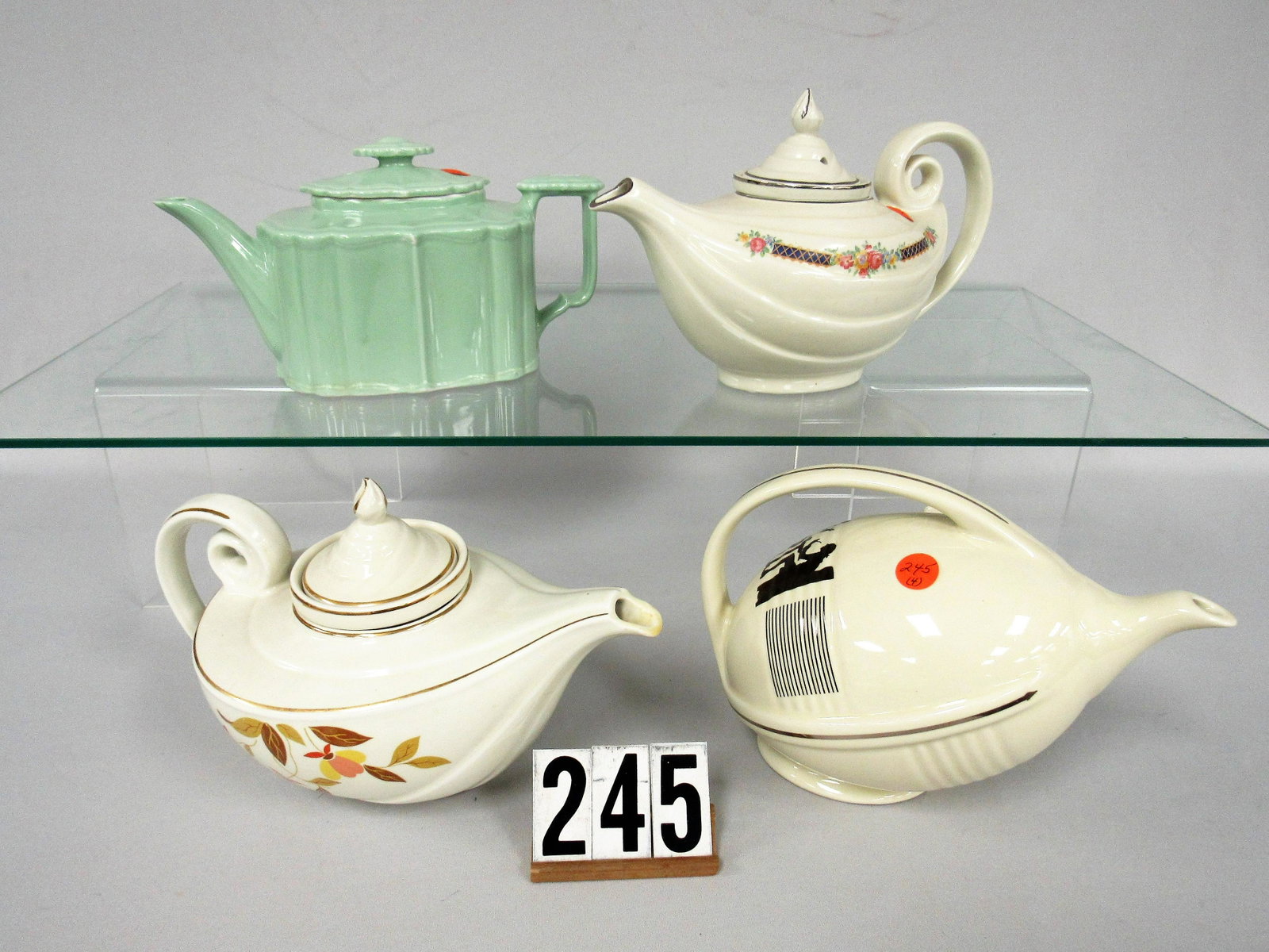 4 DIFFERENT HALL CHINA TEAPOTS:: 2 ALADDIN STYLE, SILHOUETTE PATTERN FOOTBALL (LIMITED EDITION) & PALE GREEN GLAZE - VG/G