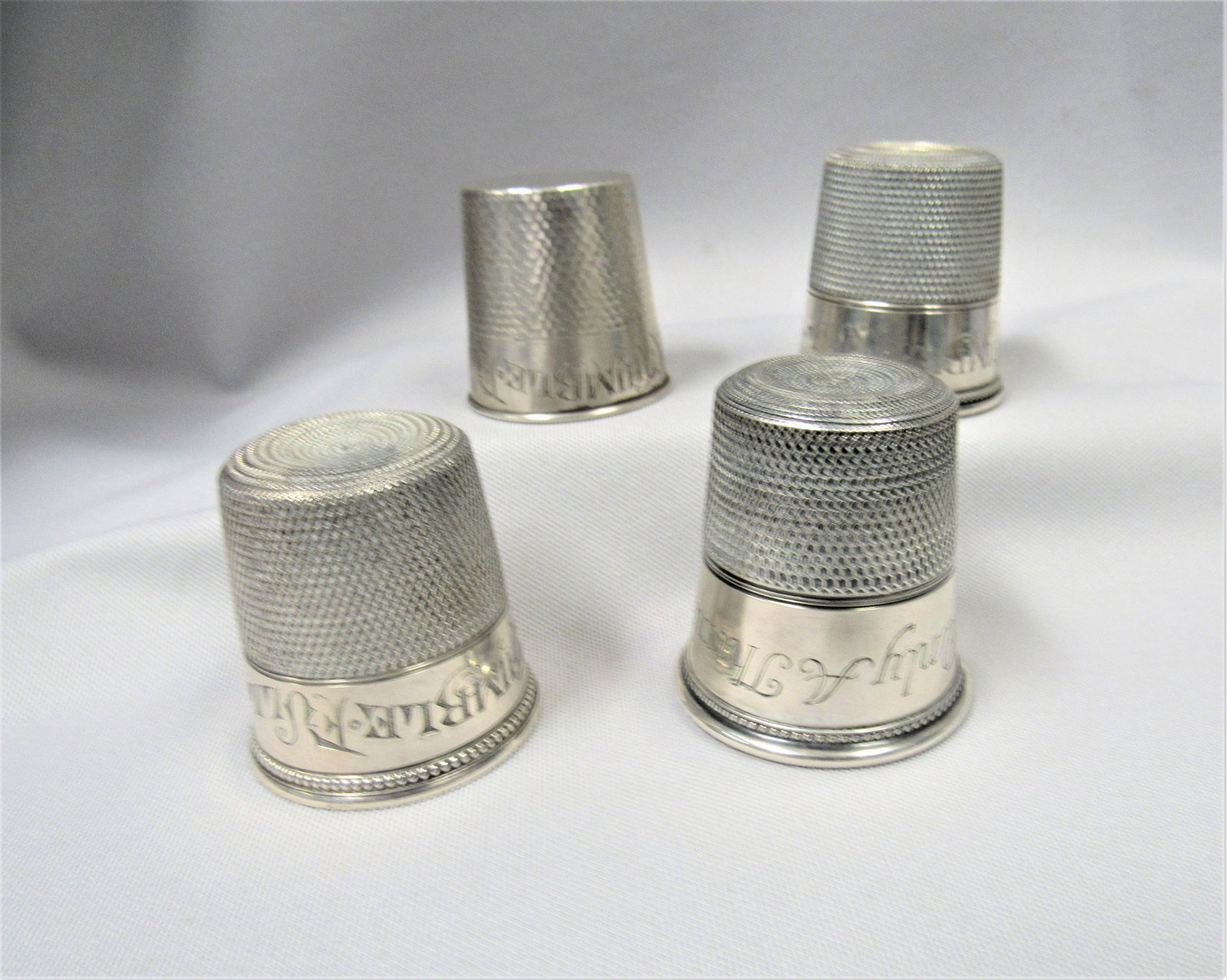 (4) STERLING SILVER THIMBLE SHOTGLASSES: G/VG