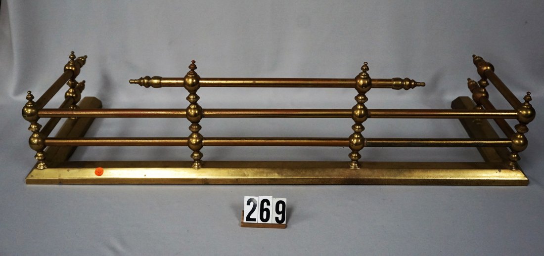 SOLID BRASS FIREPLACE FENDER,: ONE BRASS FINAL ON ONE OF THE SURROUND SIDES IS MISSING (USED), SHOULD BE POLISHED - GOOD, 41 IN W, 13 IN. D, 11 1/2 IN. H AT THE HIGHEST POINT IN THE FRONT, OTHER AREAS ARE 8 1/2" H