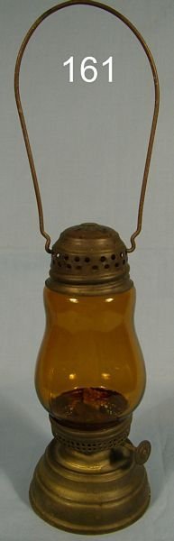 ANTIQUE SKATERS LANTERN W/ AMBER COLORED GLASS GLO