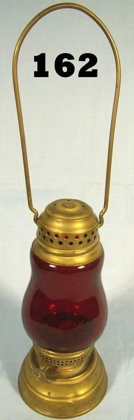 ANTIQUE SKATERS LANTERN W/ OX BLOOD COLORED GLASS