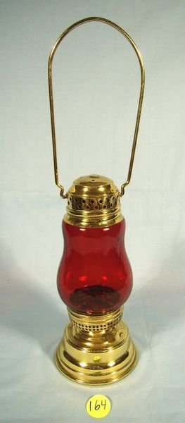 ANTIQUE SKATERS LANTERN W/ DARK RED COLORED GLASS