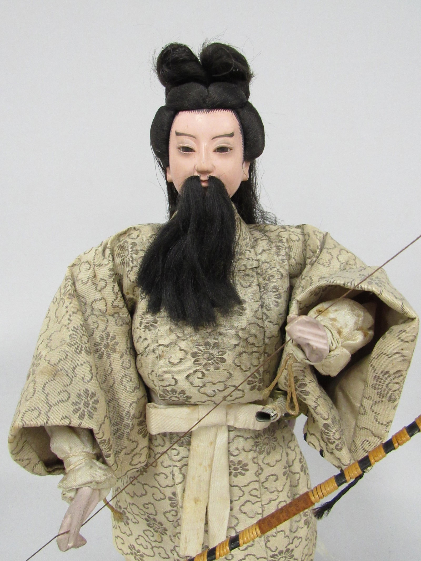 15 IN. JAPANESE ARCHER DOLL: (1 of 4)