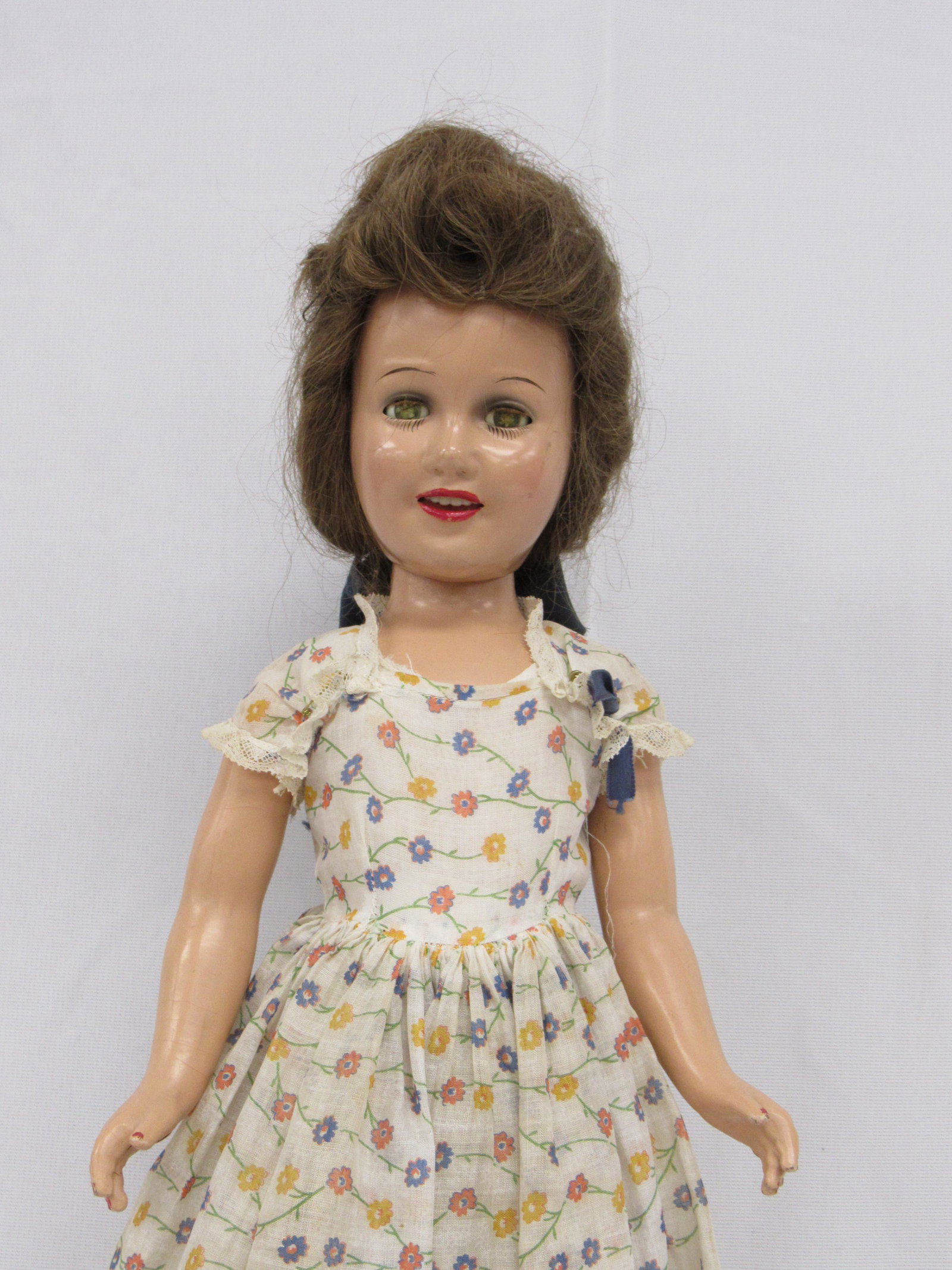 20 IN. IDEAL DEANNA DURBIN HEAD SO MARKED:: MOUTH & NAILS REPAINTED. HUMAN HAIR WIG, EYES CRAZED, LEFT HAND CRACKED & LARGE CRACK ON LEFT & RIGHT LEG - ORIGINAL DRESS & SHOES