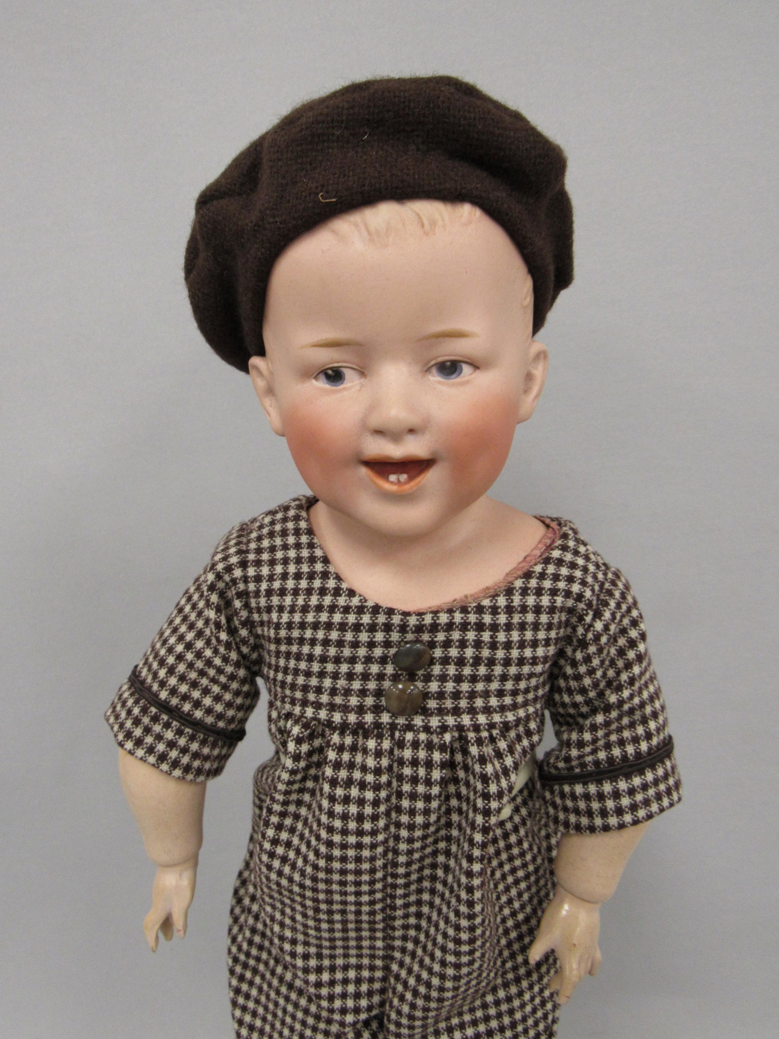 GEBRUDER HEUBACH CHARACTER BOY:: 16 IN. INTAGLIO EYES SMILING MOUTH WITH 2 TEETH - JOINTED WOODEN ARMS CLOTH BODY - VG