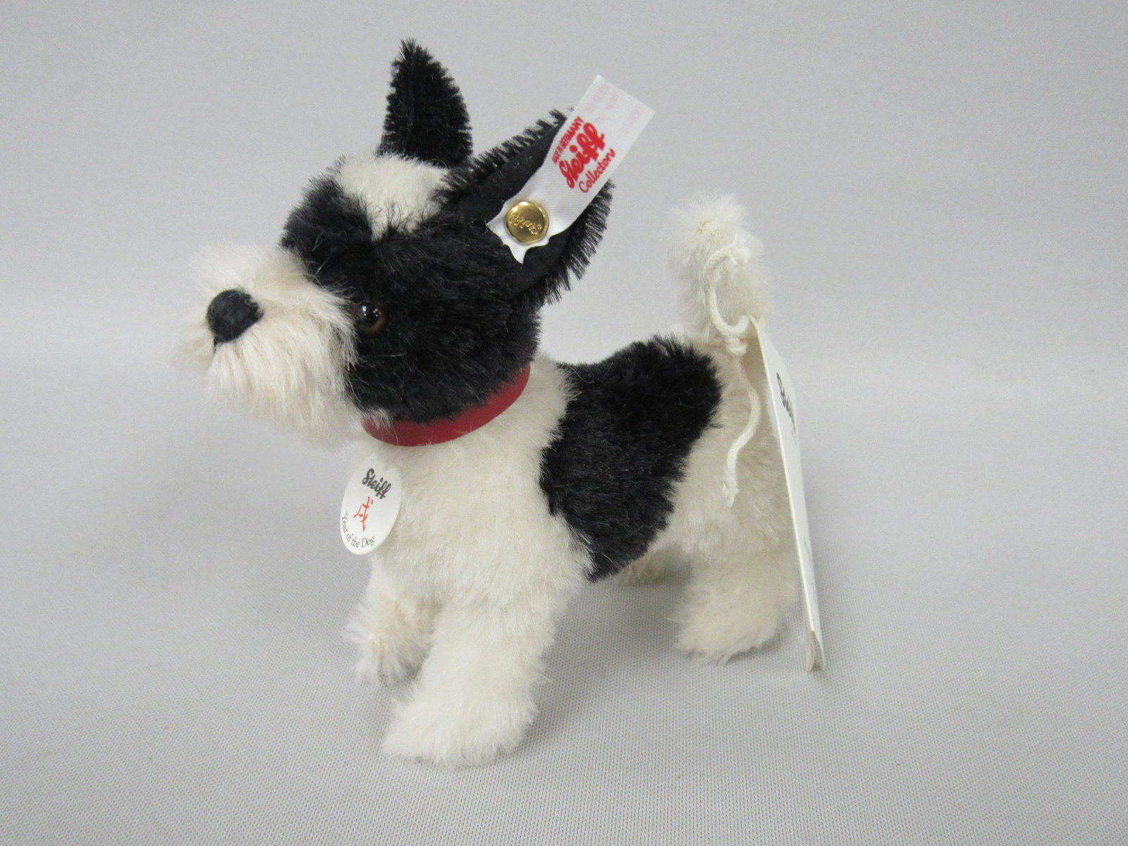 STEIFF "YEAR OF THE DOG":: WHITE EAR TAG #678