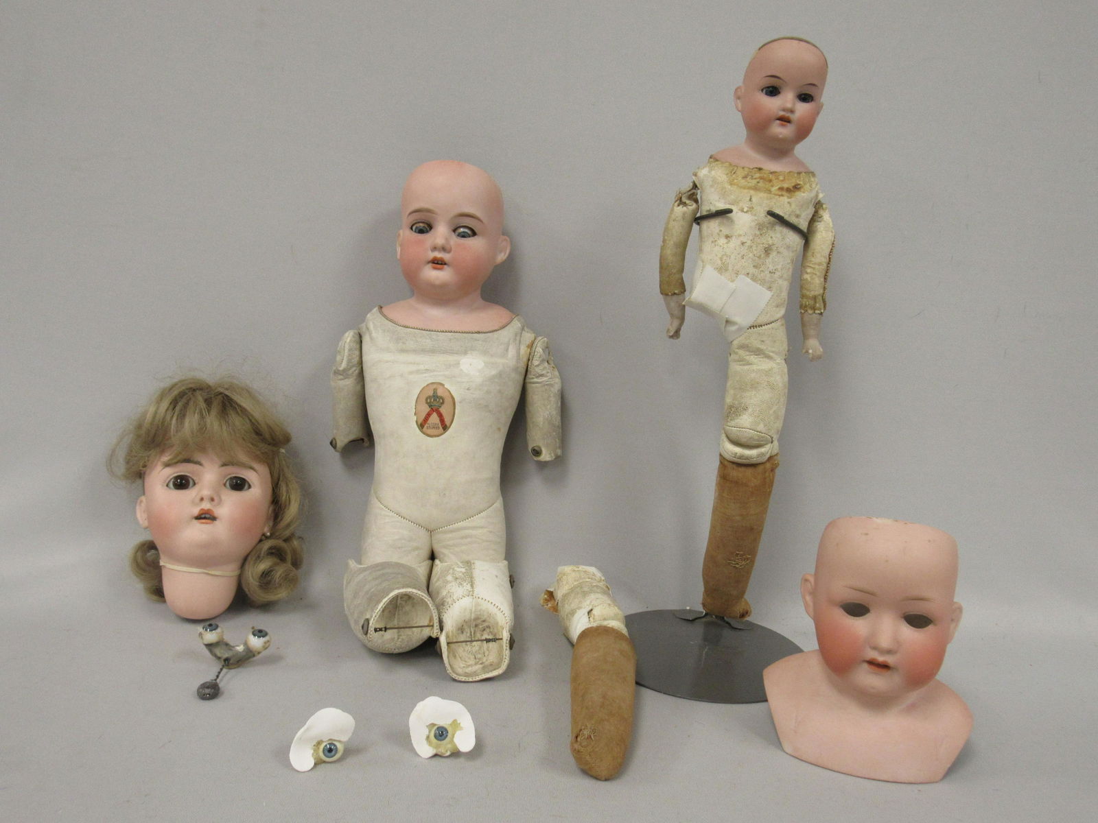 4 ANTIQUE DOLL HEADS, ETC.: (1 of 17)