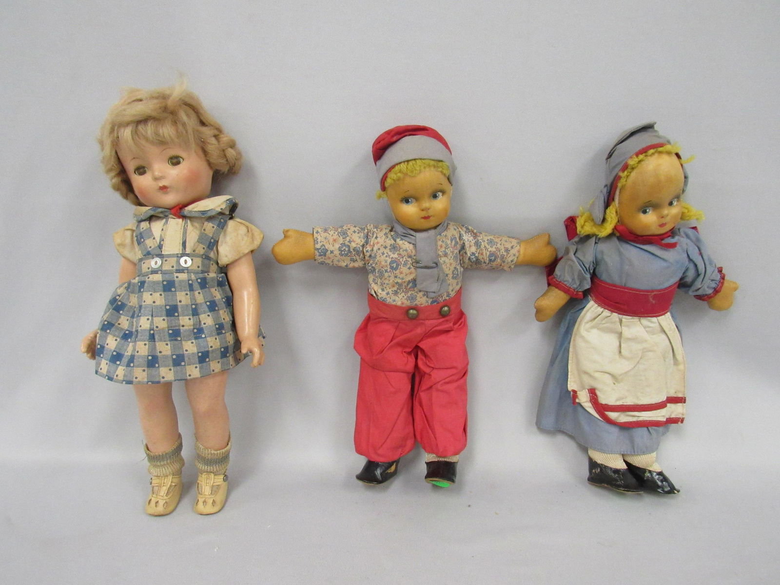 15 IN. EFFANBEE PATRICIA MARKED:: TAGGED ORIGINAL DRESS & ROMPER - MATCHING SHOES & SOCKS, LIGHT ALL OVER CRAZING - WIG ORIGINAL, NEEDS CLEANING - EYES CRAZED. 14 IN. MASK FACE DUTCH BOY & GIRL ALL ORIGINAL, NEED CLEANING