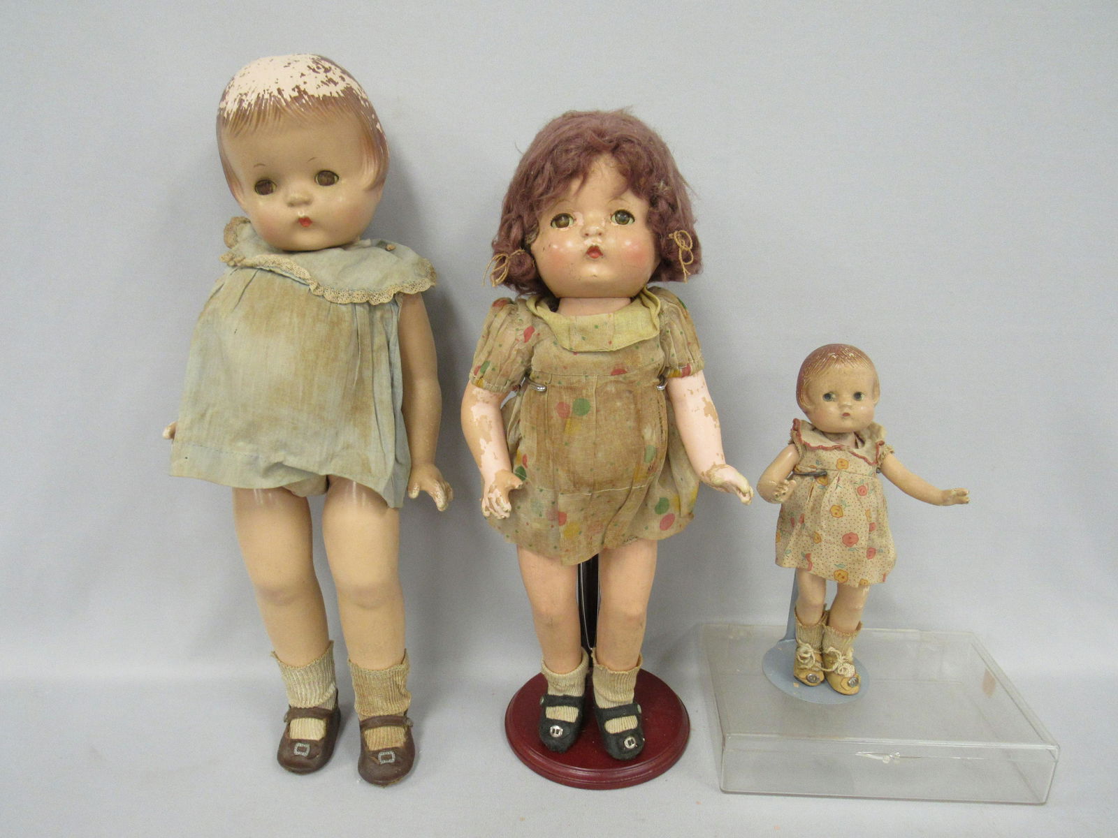 3 EFFANBEE PATSY FAMILY DOLLS:: ALL ORIGINAL UNTAGGED ROMPERS, DRESSES & SHOES & SOCKS. ALL NEED RESTRINGING. PAINT IS FLAKING ON ALL. EYES ARE CRAZED. 9 IN. PATSYETTE - 16 IN. PATSY JOAN - WIG IS SPARSE IN BACK. 18 IN. PATSY ANN -