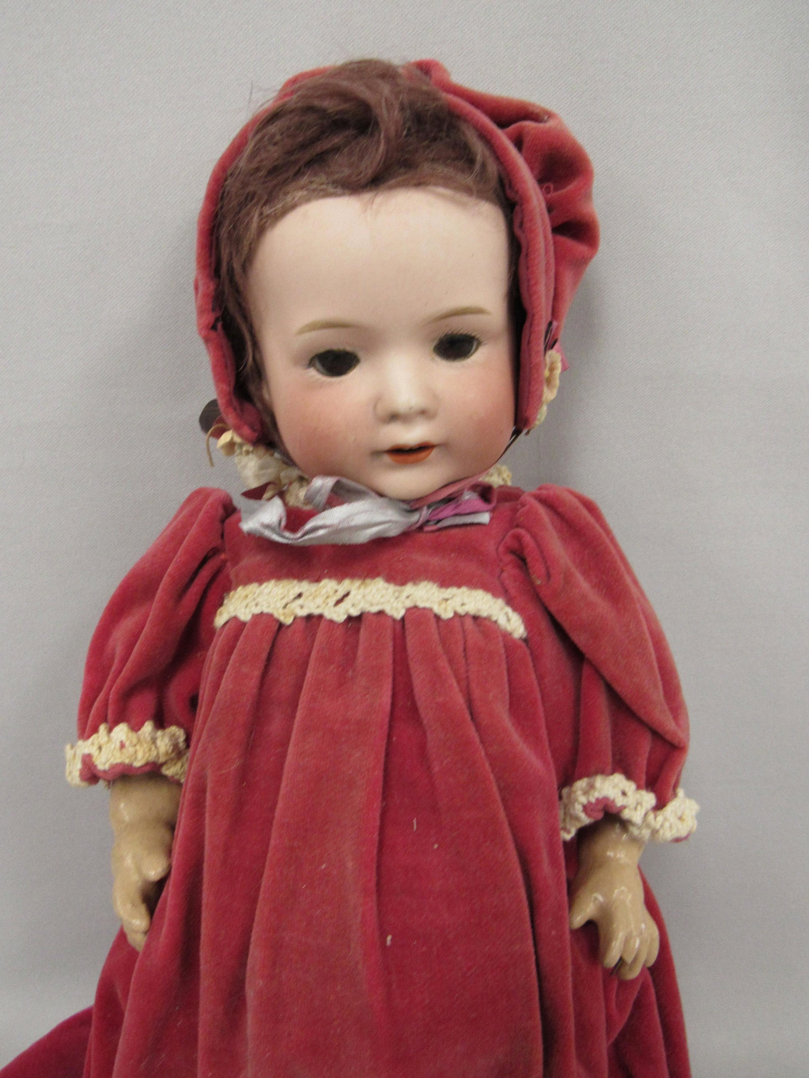 NIPPON MARKED P1:: SET EYES, OPEN MOUTH WITH TEETH, BISQUE WITH NO VISIBLE DAMAGE, ORIGINAL WIG & PATE NOT REMOVED. 14 IN. BODY WITH NORMAL WEAR, REPAINTED AT SOME TIME, MISSING FINGER ON LEFT HAND - GOOD
