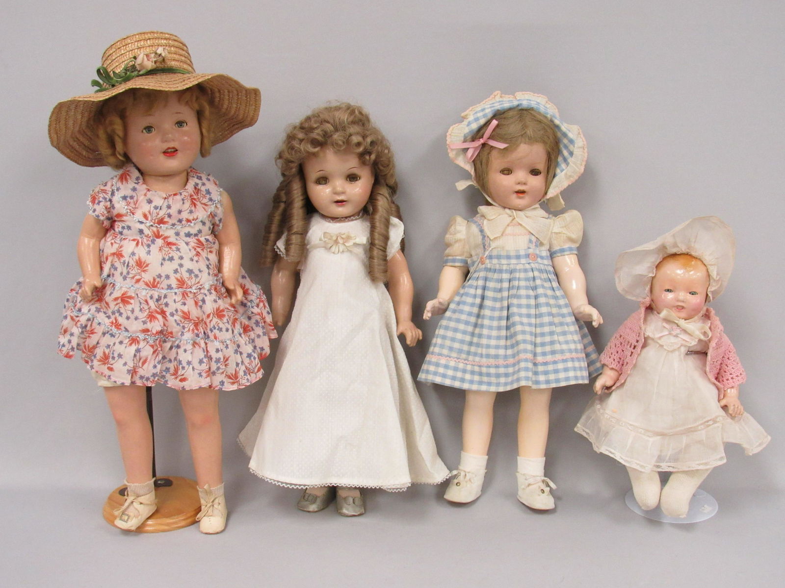 4 COMPOSITION DOLLS: (1 of 14)
