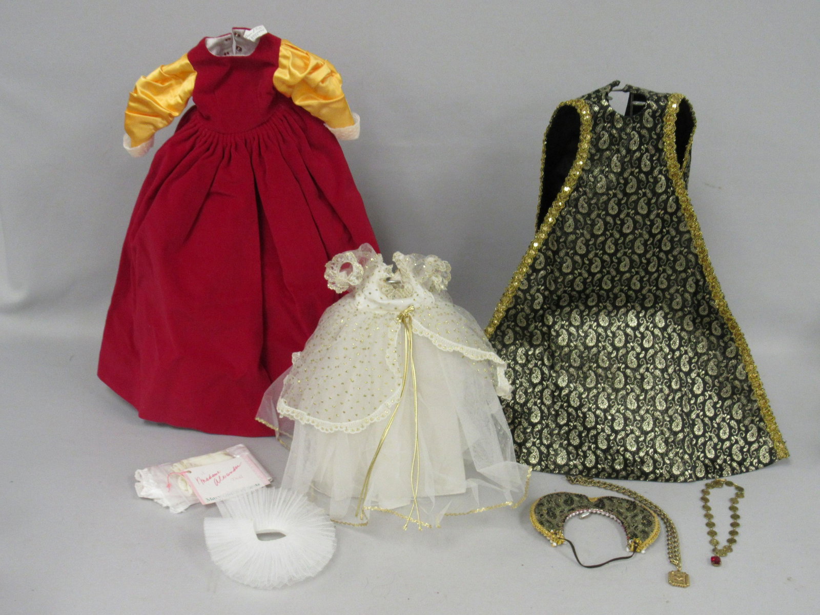 2 ALEXANDER DRESSES:: CINDERELLA FOR A 14 IN. DOLL CRISP & CLEAN - "MARY QUEEN OF SCOTS" FOR 21 IN. PORTRAIT DOLL. INCLUDES WRIST TAG, STOCKINGS, BLOOMERS, NECK RUFF, HEAD PIECE, 2 NECKLACES, OVER VEST & HEAVY VELVET GOWN.