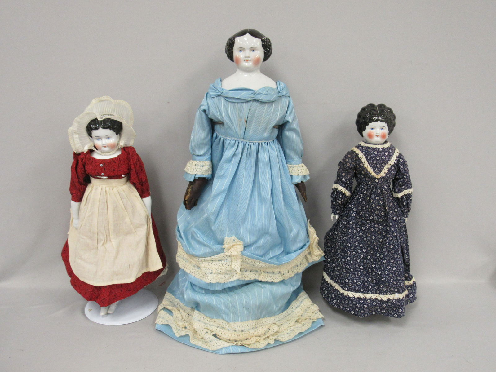 3 CHINA HEAD DOLLS.: (1 of 11)