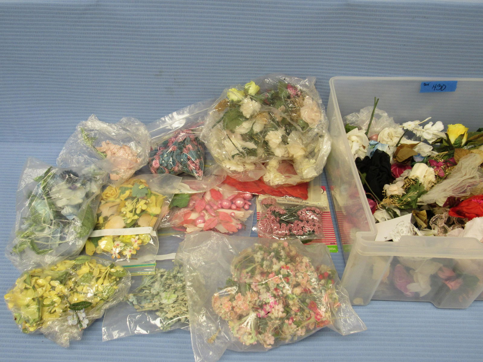 LOT OF 10 ALL BISQUE DOLLS:: BOX OF VINTAGE FLORAL TRIM & FEATHERS FOR HATS.