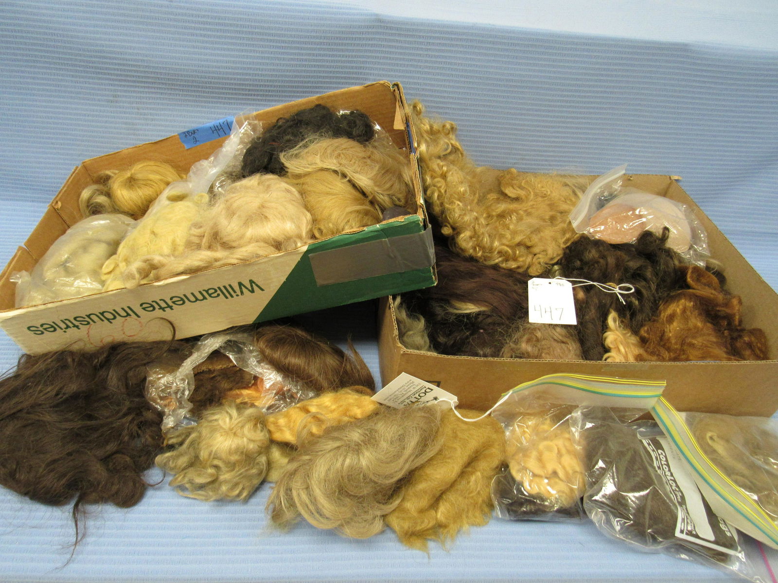 ASSORTED SIZES OF HUMAN HAIR & MOHAIR DOLL WIGS: (1 of 6)