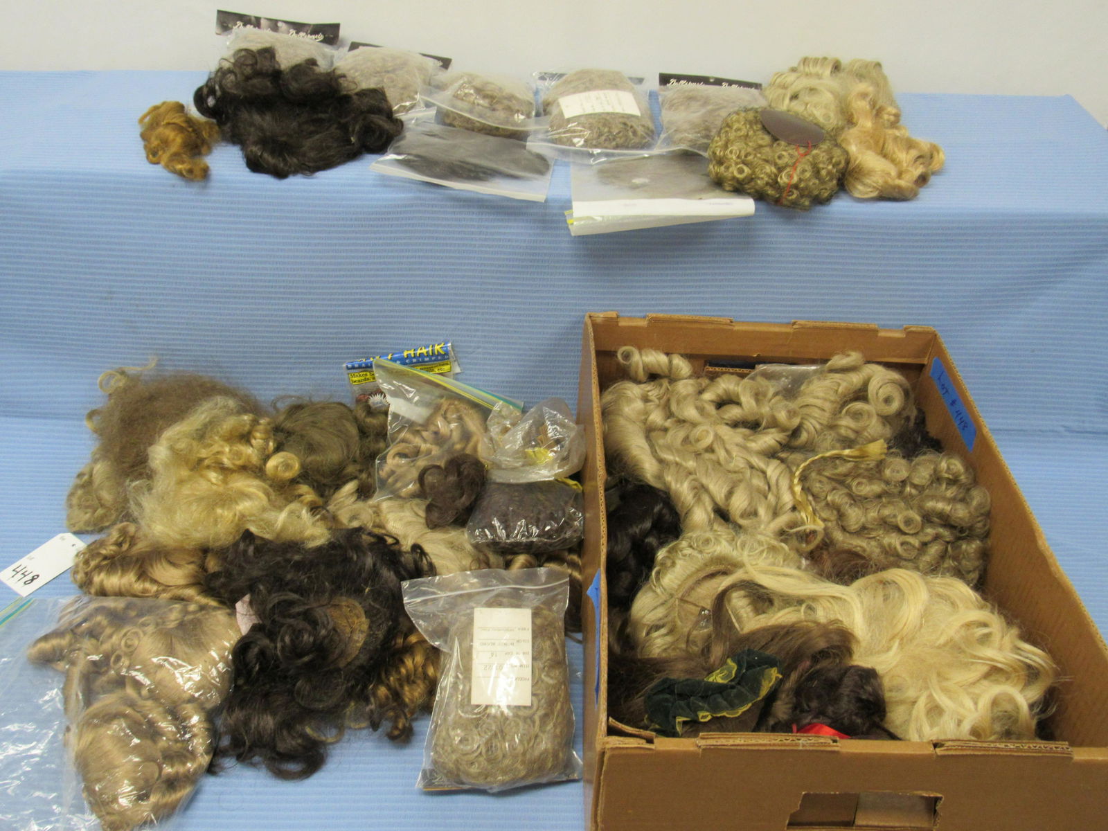 ASSORTED SIZES OF SYNTHETIC DOLL WIGS: (1 of 7)