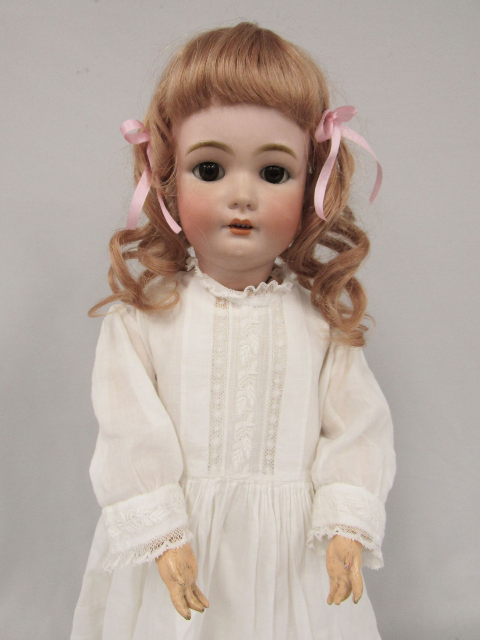 24 IN. C.M. BERGMAN MARKED C.M.B. HALBIG:: S & H 9 1/2 BISQUE HEAD NO CHIPS OR HAIRLINES, SLEEP EYES OM, COMPO BODY WITH NORMAL WEAR FOR AGE