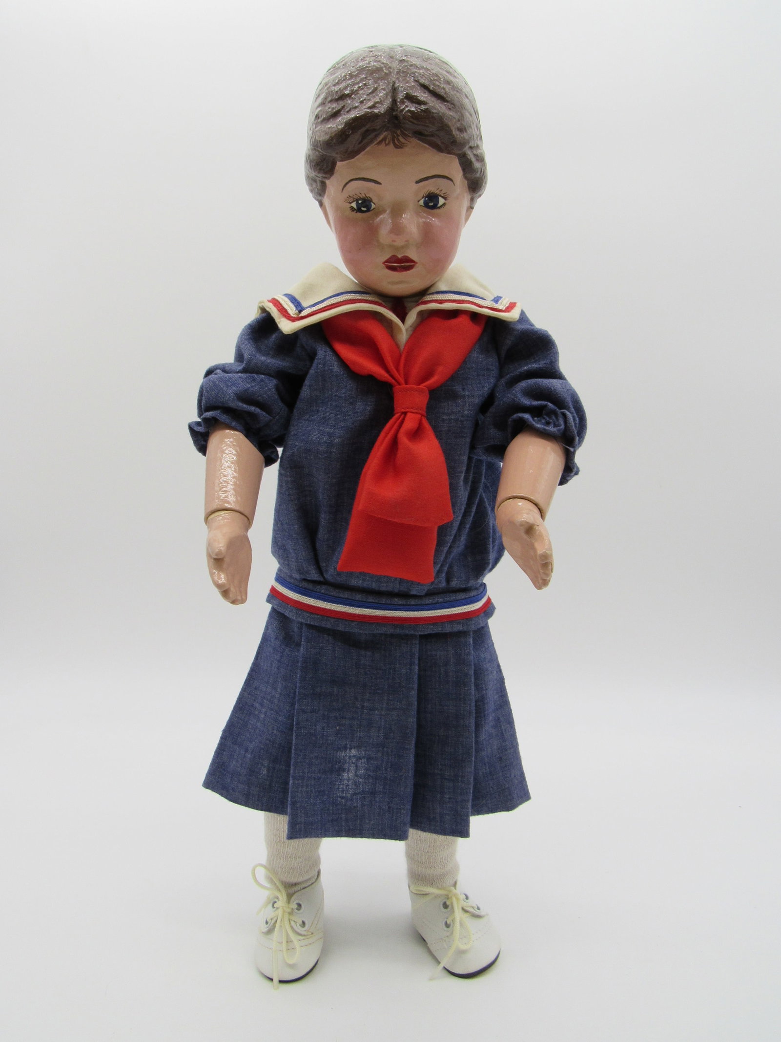 16 IN. SCHOENHUT GIRL WITH CARVED HAIR:: JOINTS TIGHT, HOLDS A POSE, AS FOUND WITH POOR RESTORATION & REPAINTED, APPEARS SOLID ENOUGH & COULD BE PROFESSIONALLY RESTORED