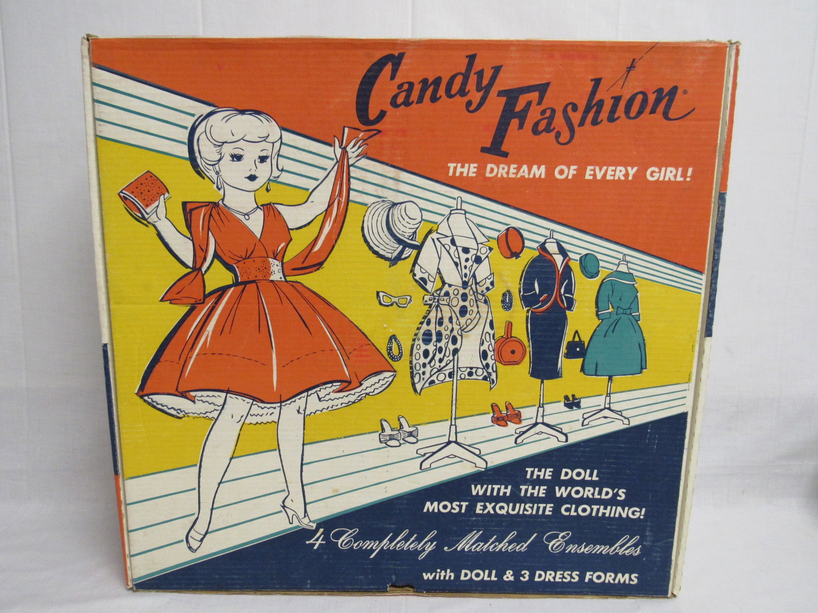 DELUXE READING "CANDY FASHION":: 21 IN. VINYL & PLASTIC DOLL - CLEAN, EXTRA JOINTS AT ELBOWS & KNEES (LEFT KNEE HAS A CRACK). MISSING 2 NECKLACES & 2 SHOES. PINK SHOE HAS CRACKED. SLIGHT FADING - BOX IS CLEAN - VG