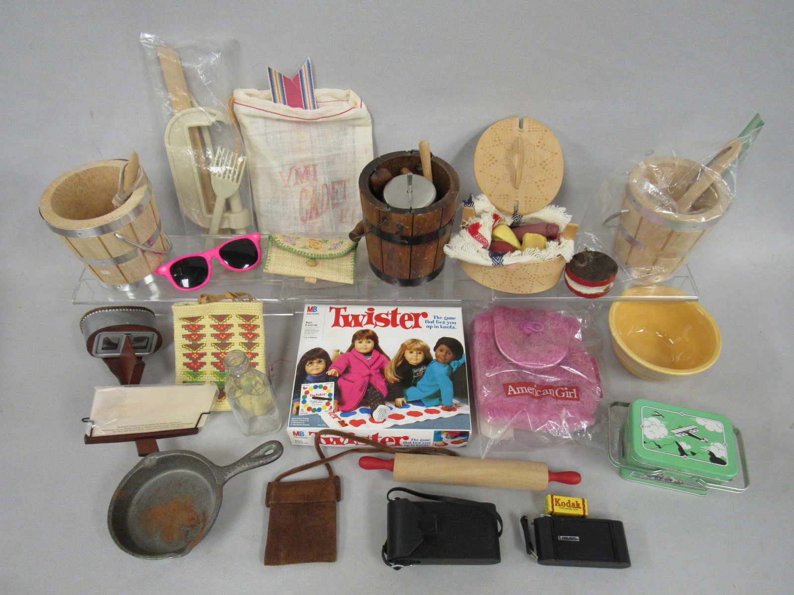 BOX LOT OF AMERICAN GIRL ACCESSORIES:: FROM DIFFERENT ERAS: I.E. BUTTER CHURN, STEREO VIEWER & CAST IRON SKILLET - G