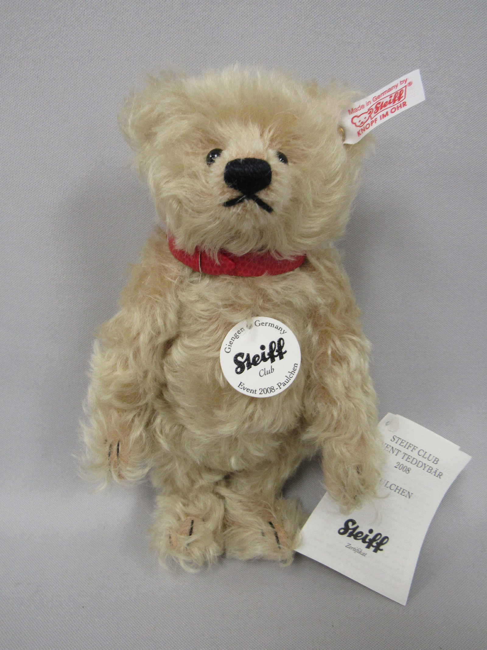 STEIFF CLUB EVENT TEDDY BEAR 8 IN. 2008:: RED & WHITE EAR FLAG EAN 420948, # 00921, CHEST TAG & HANG TAG RED COLLAR, MOHAIR