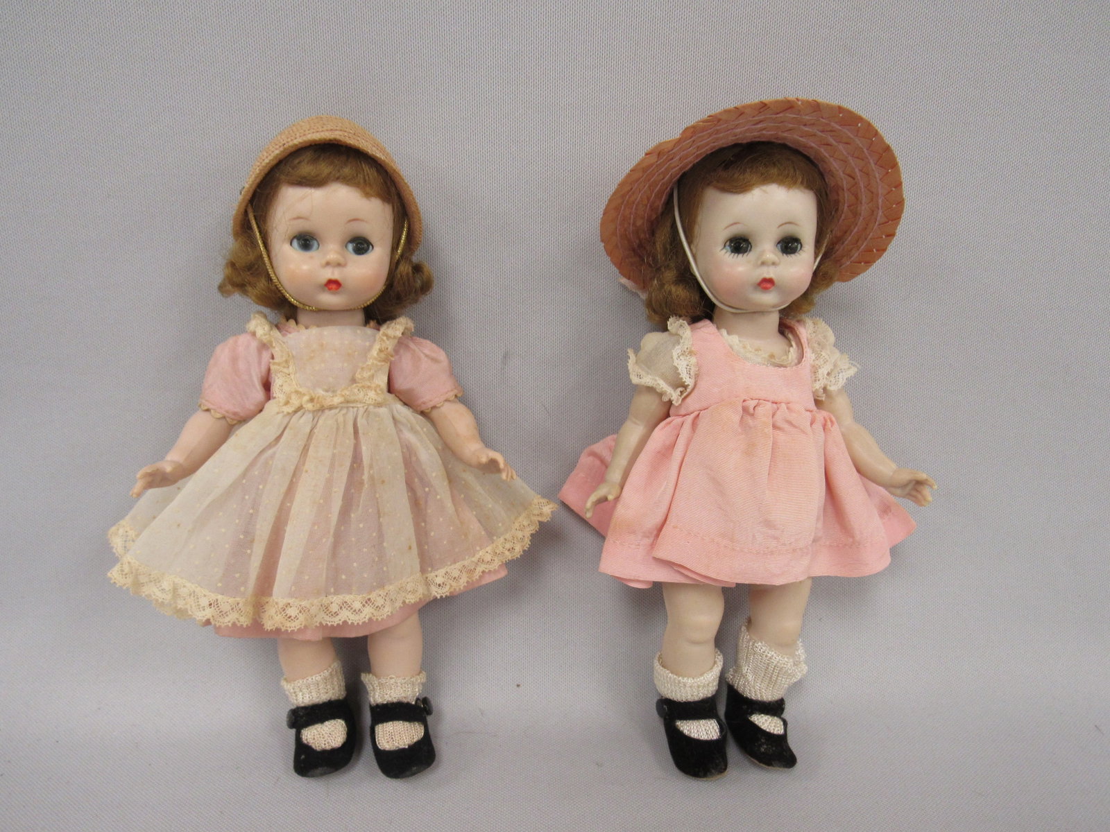 (2) 8 IN. "MADAME ALEXANDER" HP ALEXANDERKINS:: BOTH IN TAGGED ALL ORIGINAL OUTFITS WITH HATS. THEY ARE STRAIGHT LEG WALKERS 1954-55 - GOOD