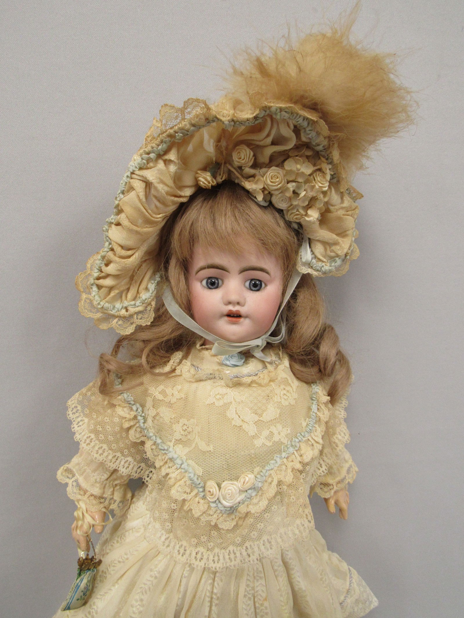 21 IN. SFBJ MARKED X DEPOSE 6:: BISQUE HEAD CLEAN REPAIRED CHIP ON TOP OF LEFT EAR & FLAKES AT LOBE. PIERCED HOLE GOES INTO HEAD. BODY IS STURDY WITH NORMAL JOINT WEAR - VG