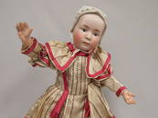 17 IN. HEUBACH BISQUE SOCKET HEAD POUTY  DOLL WITH MOLDED & PAINTED BONNET, MOLDED &  PAINTED