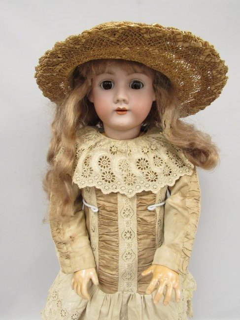 33 IN. HEINRICH HANDWERK:: MARKED ALSO GERMANY SIMON & HALBIG 7. DAMAGE FREE BISQUE HEAD. CLEAN COMPO BODY NORMAL JOINT WEAR. POSSIBLY ORIGINAL DRESS - GOOD