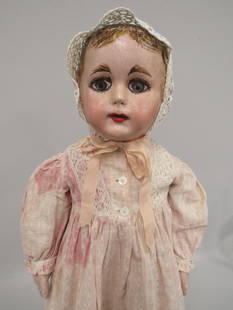 22 IN. ALABAMA INDESTRUCTIBLE DOLL:: ALL CLOTH PAINTED WITH OILS. FACE HAS BEEN RETOUCHED. BODY IS NOT MARKED. POSSIBLY ORIGINAL