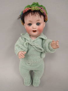 9 IN. HEUBACH KOPPELSDORF 300/13/0:: DAMAGE FREE BISQUE HEAD WITH SLEEP EYES & OPEN MOUTH WITH 2 TEETH. 5 PIECE BABY BODY WITH CRACKS ON BACK OF RIGHT ARM & DOWN LEFT ARM TO FINGERS