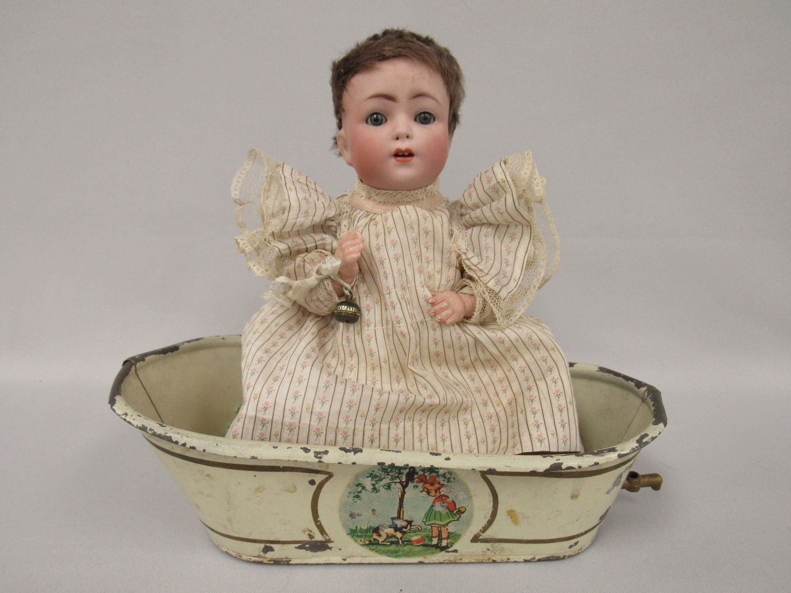 10 IN. SWEET FRANZ SCHMIDT BREATHER BABY:: WITH GERMAN HANDPAINTED TUB. BISQUE SOCKET HEAD INCISED F S & C, WITH SLEEPING BLUE GLASS EYES, PIERCED "BREATHING" NOSTRILS, OPEN MOUTH WITH TWO UPPER TEETH, ON HIS ORIGINAL FIVE PIECE COMPOSITION BA