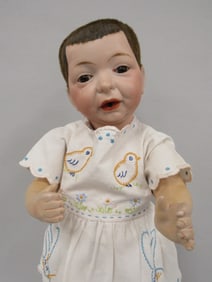 15 IN. FLOCKED HAIR NURSING BABY: