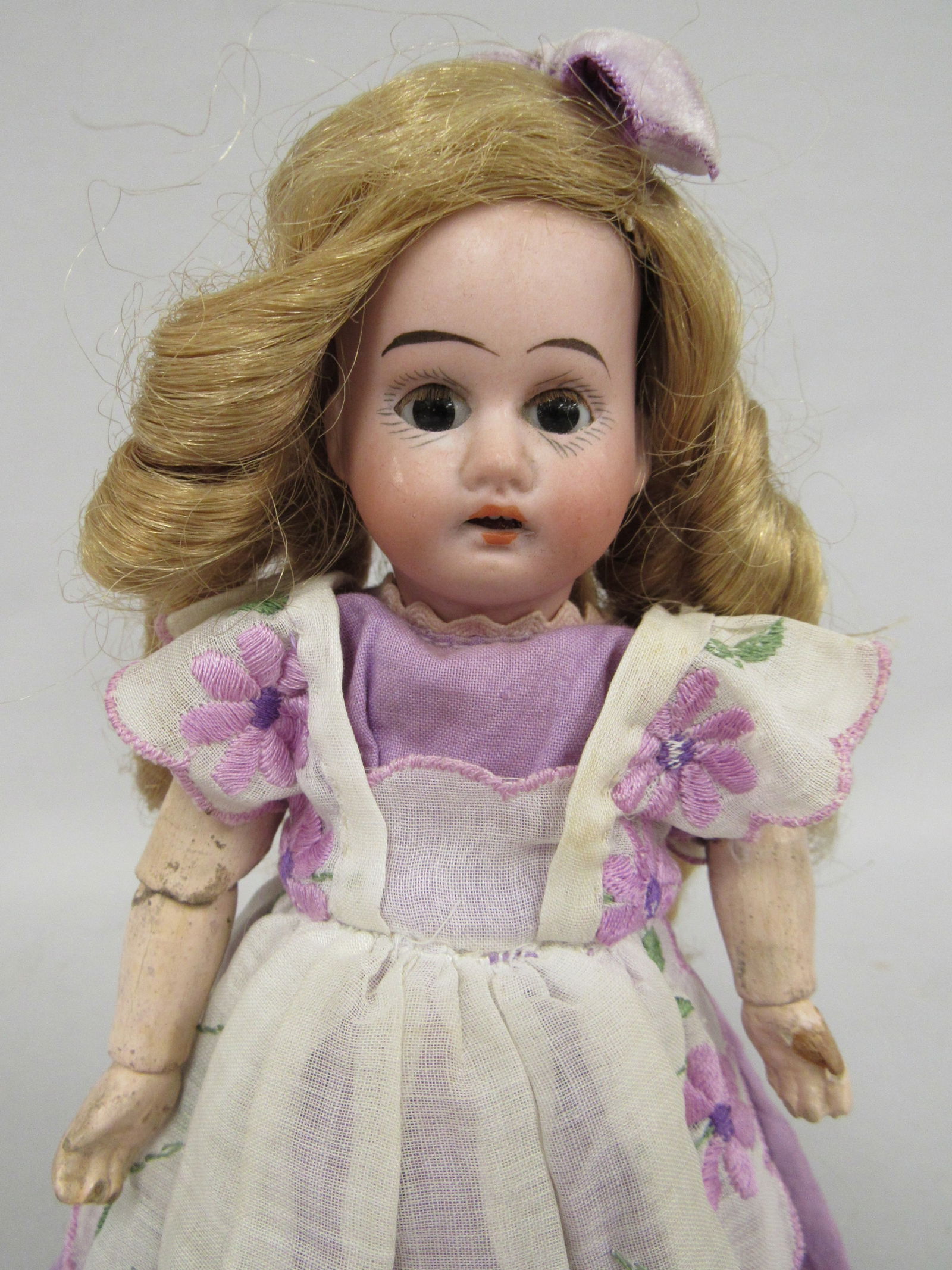 8 ½ IN. BISQUE HEAD, SET EYES, OPEN MOUTH: (1 of 13)