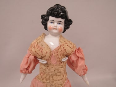 13 ½ IN. CHINA HEAD WITH FANCY HAIRDO: