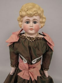 19 IN. PARIAN WITH SET GLASS EYES: