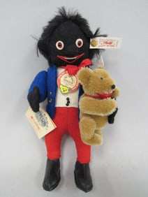 9 IN. STEIFF GOLLIWOGG WITH TEDDY BEAR: