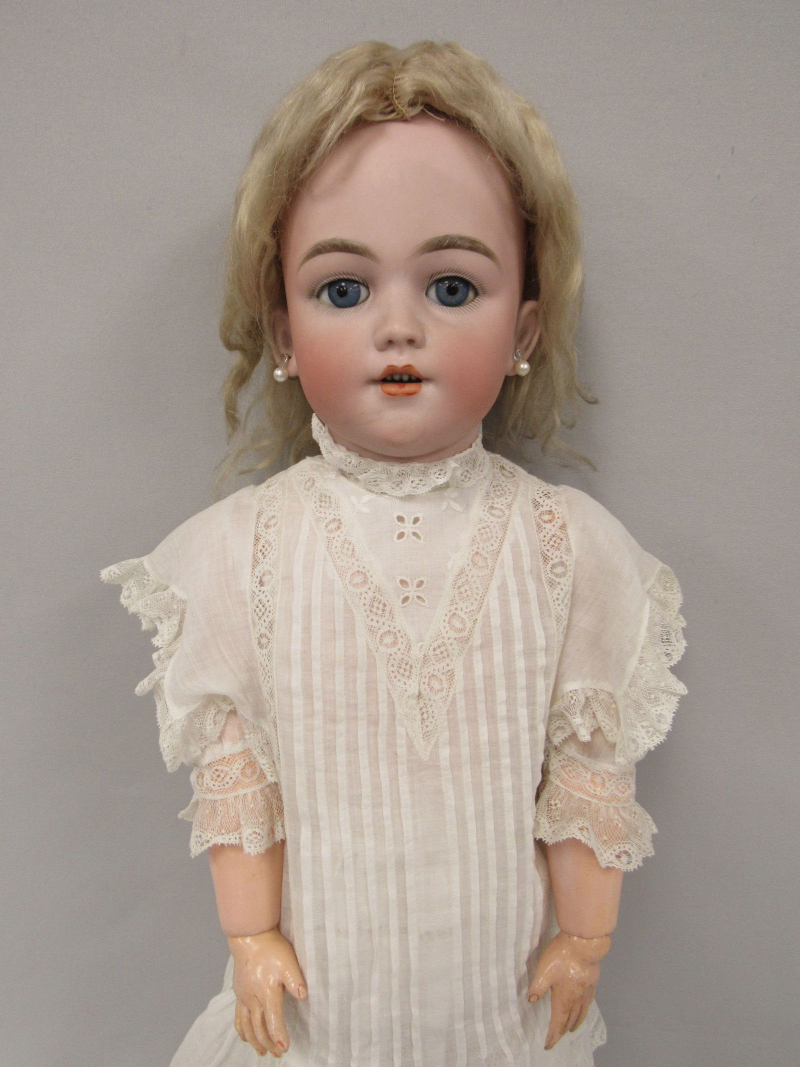 25 IN. SIMON & HALBIG "SANTA":: BISQUE SOCKET HEAD INCISED S H 1249 DEP GERMANY SANTA 12, MOLDED & PAINTED FEATURES WITH SLEEPING BLUE GLASS EYES, MOLDED EYEBROWS, PIERCED EARS, OPEN MOUTH WITH FOUR MOLDED TEETH WITH TRADEMARK DARK