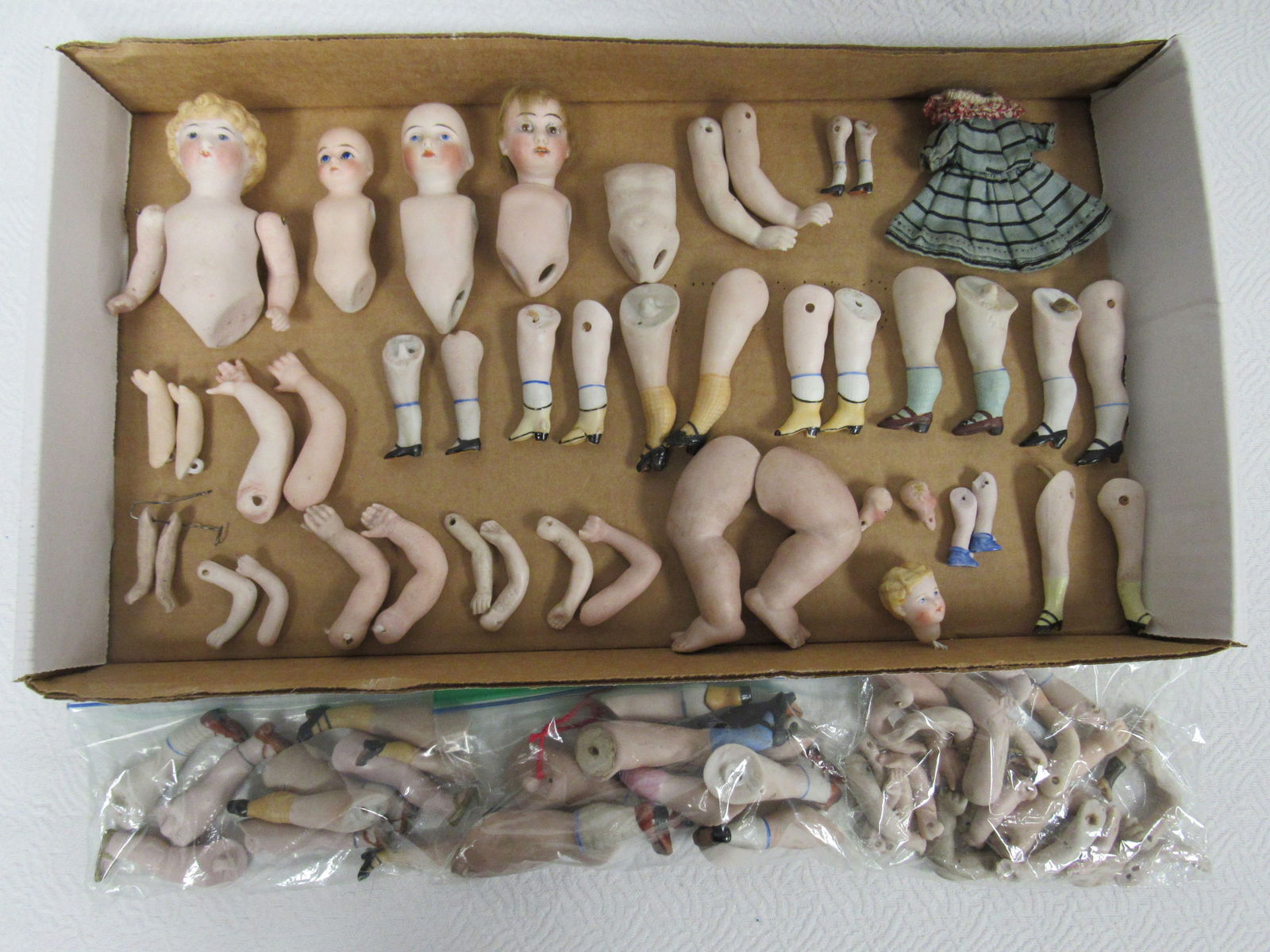 LARGE LOT OF BISQUE DOLL PARTS: (1 of 6)