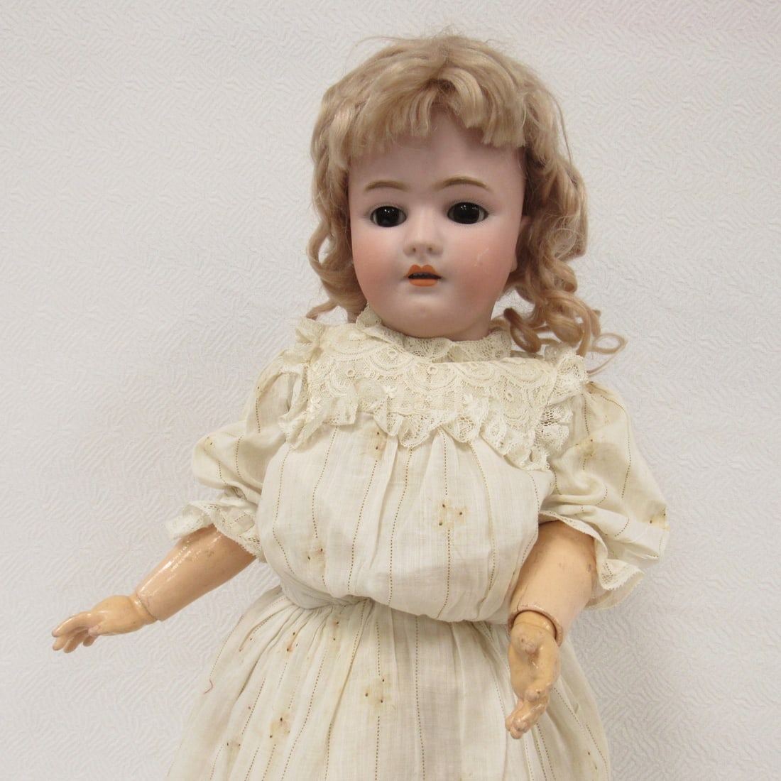 22 IN. HEINRICH HANDWERK MARKED GERMANY SH 1011X:: HALBIG BISQUE HEAD HAS NO DAMAGE, OPEN MOUTH, SLEEP EYES, PIERCED EARS & SCUFF ON CHEEK. COMPO BODY IS CLEAN WITH ORIGINAL FINISH & NORMAL JOINT WEAR. DOLL IS ALL ORIGINAL WITH WIG, UNDERWEAR DRESS, S