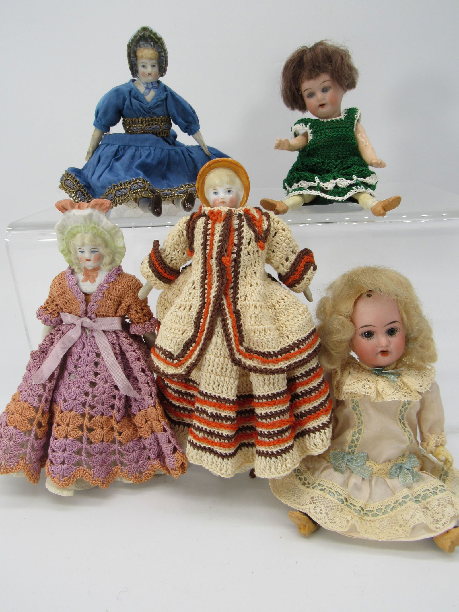 BOX OF 5 DOLLS: 2 BISQUE, 3 BONNET HEADS:: INCLUDES 8 IN. RECKNAGEL MARKED R/A D.E.P. CLEAN SOCKET HEAD, SLEEP EYES, OPEN MOUTH WITH TEETH, COMPO ARMS & LEGS, COMPO TORSO, 6 IN. SOCKET HEAD, SLEEP EYES, OPEN MOUTH WITH TEETH, COMPO BODY MARKED