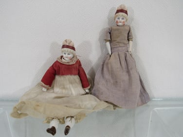 2 PARIAN DOLLS WITH THE SAME HEAD: