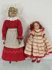 PAIR OF INTERESTING ANTIQUE DOLLS: