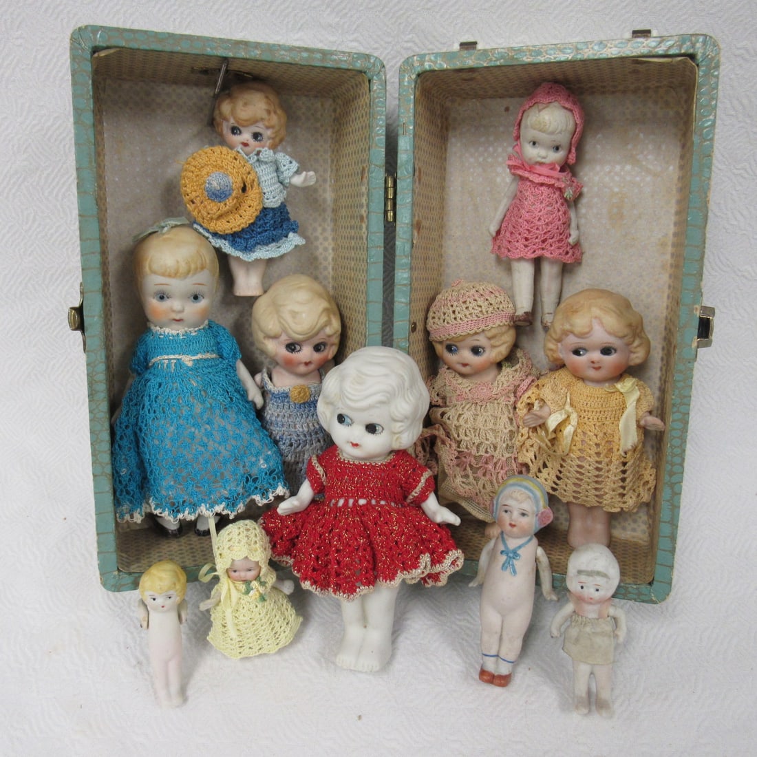 TRUNK OF 11 SMALL BISQUE DOLLS: (1 of 8)