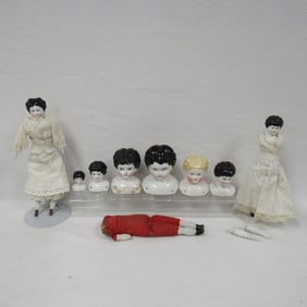 BOX LOT OF CHINA HEAD DOLLS: