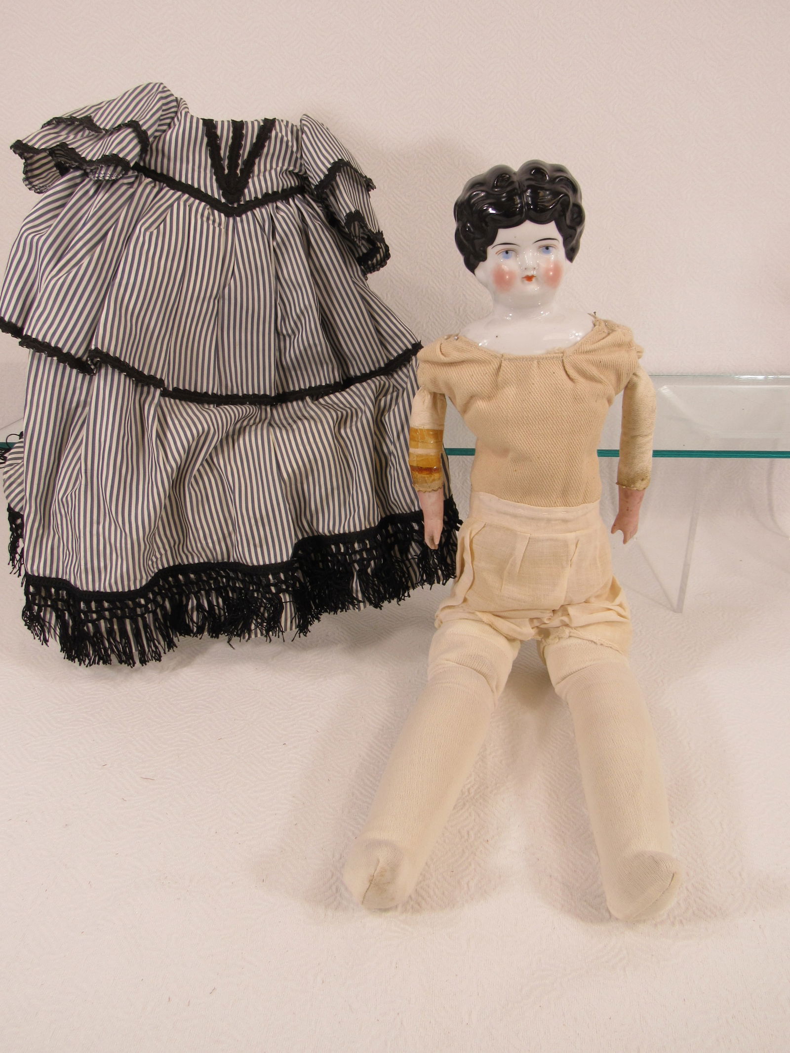 21 IN. LOWBROW CHINA HEAD: (1 of 7)