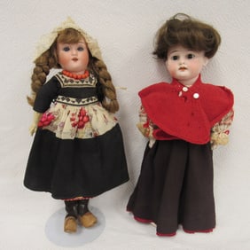 2 BISQUE HEAD GIRLS IN ETHNIC COSTUME: