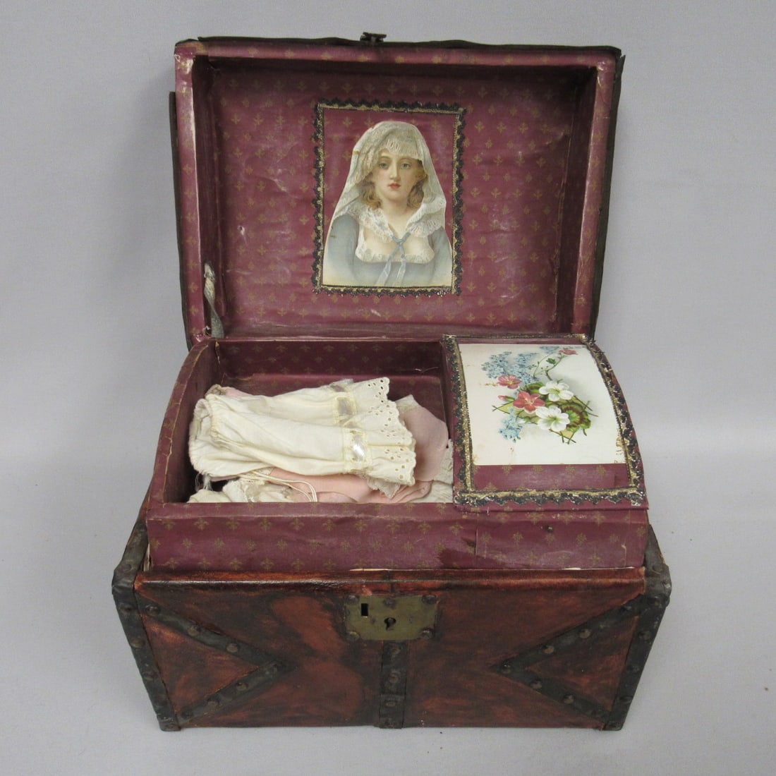 SMALL LEATHER, METAL & WOOD STUDDED DOLL TRUNK: (1 of 9)