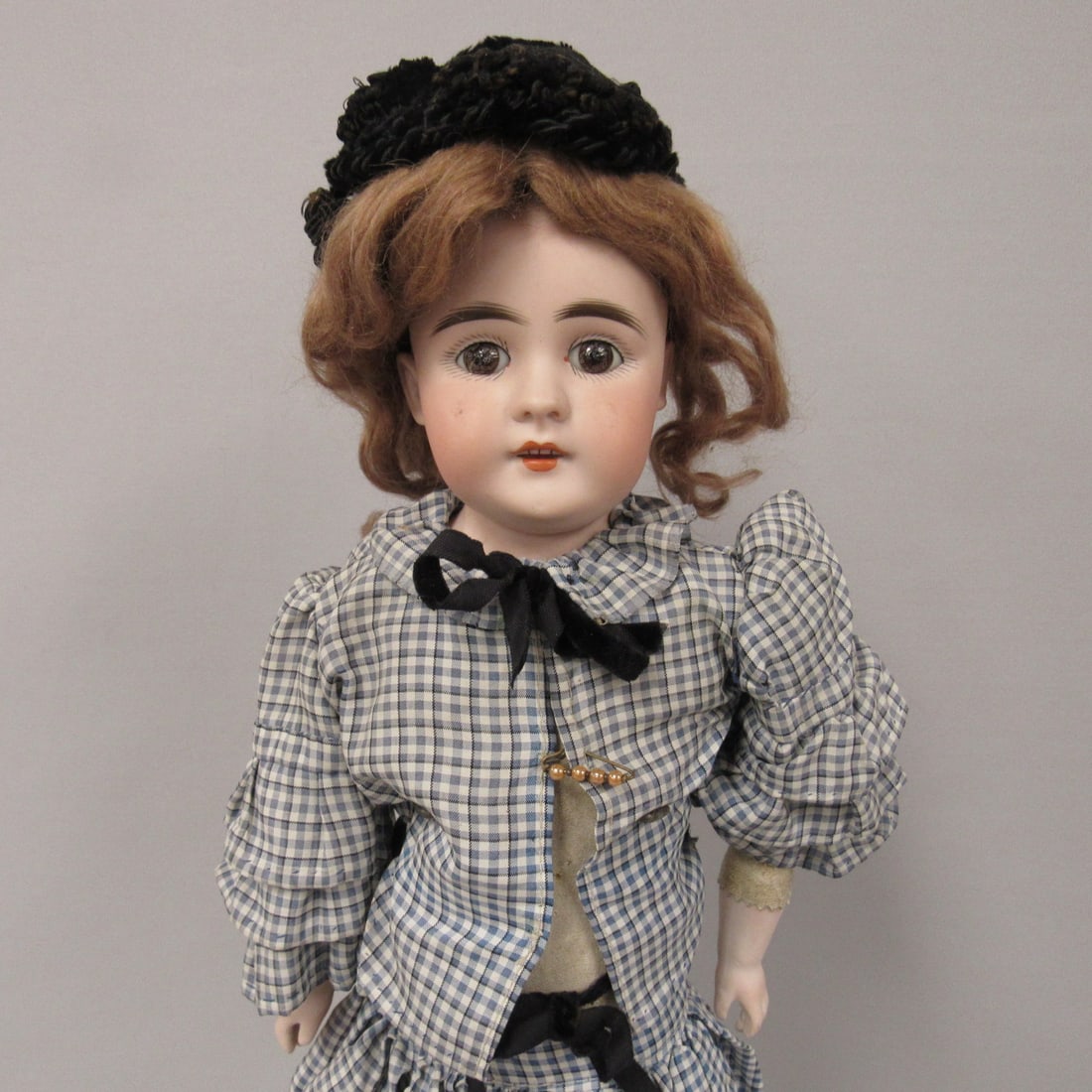 20 IN. BISQUE DOLL:: BISQUE SHOULDERPLATE IS DAMAGE FREE MARKED ONLY WITH 7 1/2, SET EYES WHICH ARE CRACKLED, OPEN MOUTH WITH TEETH. STURDY KID BODY WITH BISQUE LOWER ARMS